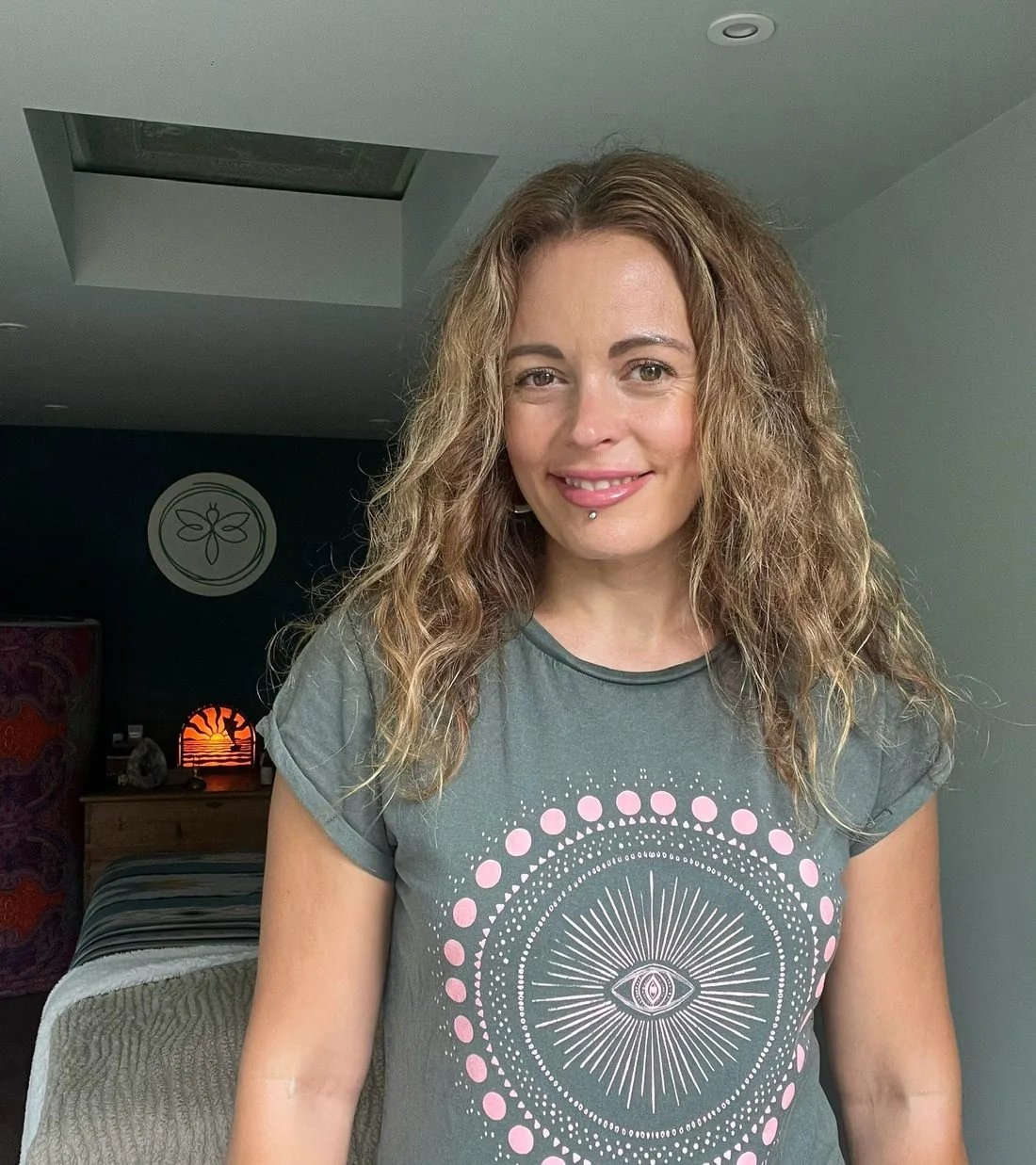 Zoe of Firefly Ascension in her treatment room in Godalming
